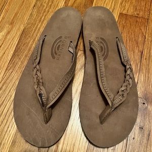 Rainbow flip flops. Never worn outside.